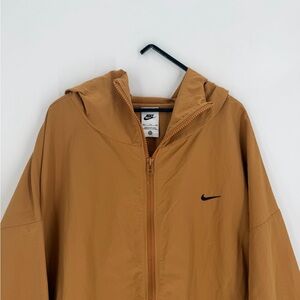 Nike Sportswear Everything Wovens Oversized Hooded Jacket In Brown